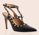 Zapatos con remaches dorados de Vélez